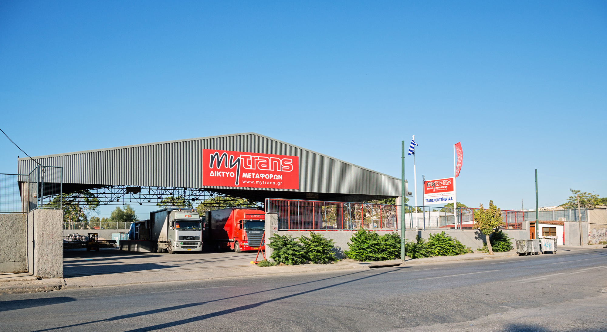 mytrans trucks at a loading facility